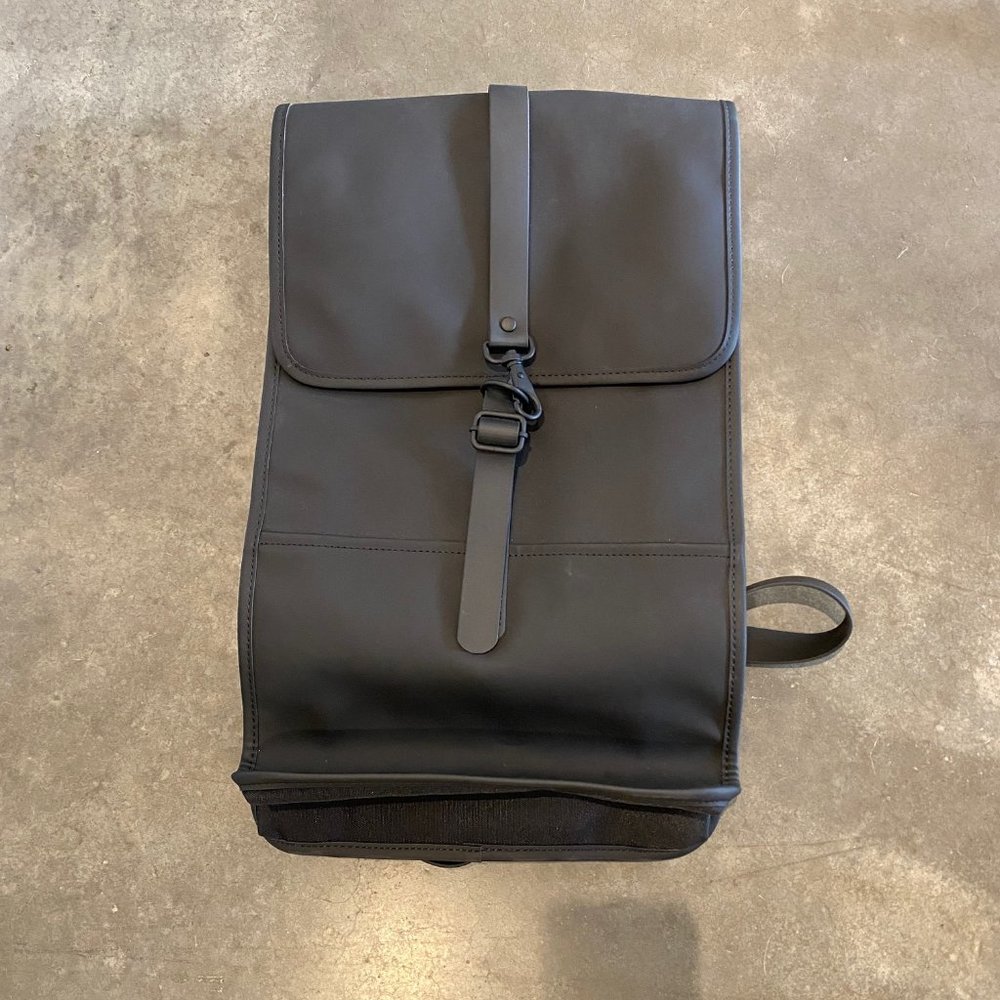Large black waterproof Rains backpack